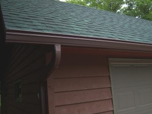 Home with seamless aluminum gutters.