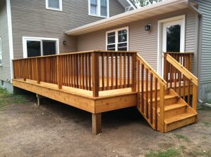 A beautiful deck addition on a residential home.