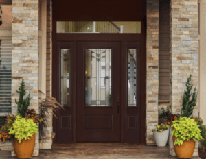 Elegant dark wood entry door of suburban home.