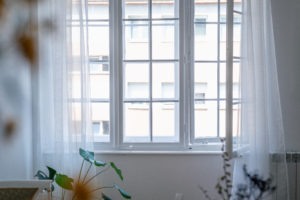Replacement windows with white frames.