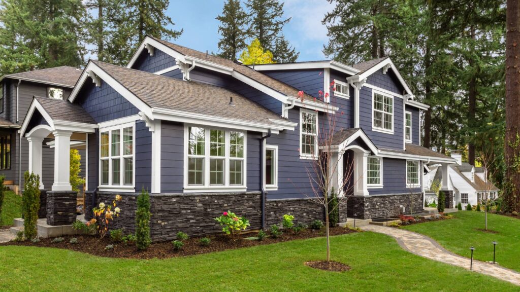 blue home with white gutters in Minneapolis